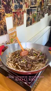 A review of a Halal Japanese restaurant in Birmingham, highlighting their sukiyaki hot pot experience, curry dishes, and cute anime-themed interior.