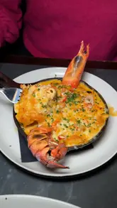 A couple visits Maxwell's to try their new lobster menu and margarita selection. The video features close-ups of the lobster mac and cheese, surf and turf, and various cocktails, interspersed with the creators' reactions and shots of the restaurant interior.