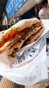 A short, energetic video showcasing a £5 pizza deal at Sud Italia in Old Spitalfields Market. The video features quick cuts of the pizza, the menu, and the market stall setup, effectively highlighting the affordability and quality of the food.