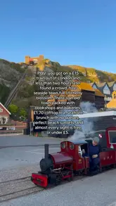 A travel-focused reel showcasing a day trip to a seaside town, highlighting the cliff railway, beach huts, and affordable local experiences.