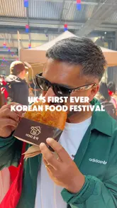 A fast-paced, handheld-style video showcasing the first-ever Korean Food Festival in London. The creator highlights various street food items, including BBQ skewers, hotteok pancakes, Korean fried chicken, and desserts, while capturing the busy, vibrant atmosphere of the event.