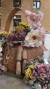 A montage video showcasing various floral installations across Chelsea for the Chelsea in Bloom event. The video highlights the creative displays, including sculptures and arches, set to music with text overlays providing event details.