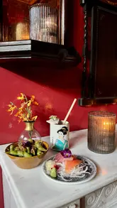 A polished montage showcasing the interior, cocktails, and Japanese-inspired small plates at Bar Tokyo in Cheltenham.