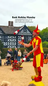 A family-focused vlog showcasing a day out at Speke Hall, featuring medieval reenactments, a jester performance, woodland play areas, and cafe facilities.
