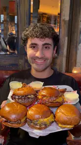 Meatstop's "Nutta" and "Car Boot" burgers with dry-aged beef and crispy potatoes at Commercial Tavern.