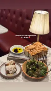 A short, polished montage showcasing the interior and various dishes at Bacchus in Cardiff, presented as a date night recommendation.