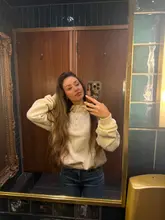 A mirror selfie taken in a restaurant bathroom, featuring a person posing. The image does not showcase the venue's interior, food, or atmosphere, serving only as a personal lifestyle post rather than a promotional asset for the hospitality business.