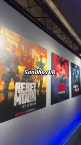 A vlog-style video showcasing a visit to Sandbox VR, featuring a robot bartender and gameplay footage from a Stranger Things VR experience.