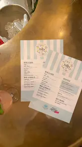 A promotional reel featuring creator Poppy Cooks at a Bill's restaurant event, showcasing a limited-edition menu collaboration. The video includes shots of various potato-based dishes, burgers, and cocktails, with the creator sharing her positive experience and reactions to the food.