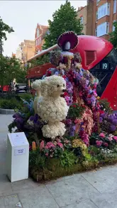 A montage of various floral art installations located in Chelsea, London, promoting the annual Chelsea in Bloom festival.