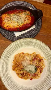 A promotional video for Bella Italia's bottomless pasta deal, featuring quick cuts of various pasta dishes, chicken strips, and the restaurant exterior.