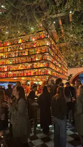 A creator visits the launch party of a new Tigermilk venue in Shoreditch, capturing the stylish interior, cocktail preparation, and various food items like tacos and churros.