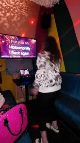 A high-energy, vlog-style reel showcasing a visit to Pong and Puck in Manchester. The video features the creators engaging in various activities including karaoke, shuffleboard, table tennis, and darts, interspersed with shots of cocktails and pizza. The editing is fast-paced and captures the fun, social atmosphere of the venue.