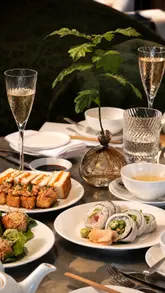 A high-quality, polished video showcasing the Sakura Afternoon Tea experience at Nobu Hotel Portman London. The video features a sequence of shots including a matcha masterclass, the venue's elegant interior, and close-ups of the Japanese-inspired afternoon tea spread, including sushi, sandwiches, and scones.