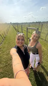 A vlog-style reel showcasing a vineyard tour experience at Yorkshire Heart Vineyard, featuring a walk through the vines, a look at the winemaking process, and a wine and cheese tasting.