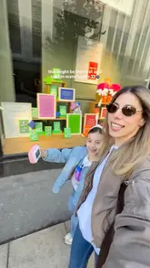 A short, upbeat vlog-style video featuring a creator and a child visiting a new cafe called Plant Blends in Manchester. The video captures the exterior, the menu, and close-ups of the acai bowls and smoothies, presenting the venue as a bright and healthy spot.
