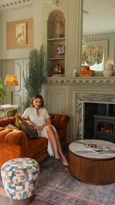 A two-person vlog showcasing a stay at Burnham Beeches Hotel, featuring the room, spa facilities, afternoon tea, dinner, and breakfast in bed.