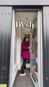 The video is a short, engaging review of Dysh in Sheffield, highlighting their new small plates menu. It features shots of the restaurant's exterior and interior, a look at the menu, and close-ups of various dishes including arancini, a flatbread platter, beef short rib, and meatballs. The creator is shown enjoying the food, providing a personal touch to the review.