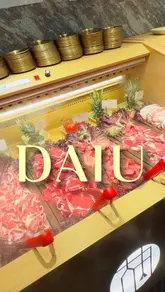 A tour of a hotpot and BBQ restaurant, showcasing the variety of raw ingredients, soup bases, and sauce stations available for the buffet.