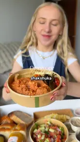 A creator reviews a new brunch takeaway spot called Omnivour in Gateshead, showcasing their signature brunch box, shakshuka, and boureka box. The video includes shots of the venue exterior, the ordering kiosk, and close-ups of the food, providing a clear overview of the menu and the takeaway-only format.