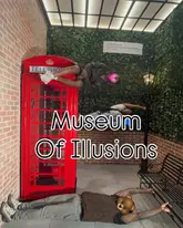 A photo taken at the Museum of Illusions in London, showing a family interacting with an exhibit designed to create an optical illusion of defying gravity.