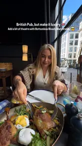 A promotional video showcasing a luxury British pub experience at the Conrad London St. James, featuring oysters, a theatrical bottomless Bloody Mary trolley, a duck brunch dish, and dessert.