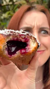 A creator reviews gluten-free doughnuts from Borough 22, showcasing different flavours and sharing her reactions in a casual, vlog-style format.