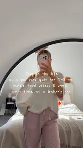 A personal day-in-the-life vlog following a creator who balances content creation with part-time work at a local bakery, featuring shots of the bakery, coastal walks, and food preparation.