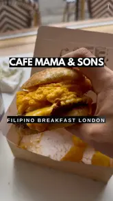 A short, engaging review of a Filipino breakfast burger at Cafe Mama & Sons in Camden. The video features the exterior and interior of the cafe, followed by a close-up look at the Longanisa breakfast burger meal, which includes tater tots and an ube matcha drink.