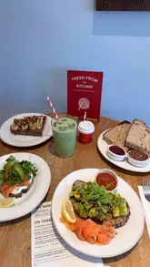 A short, casual reel showcasing a new 'On Toast' menu at Gail's Bakery, featuring close-ups of various sourdough dishes, pastries, and a matcha latte, with a brief appearance by a child.