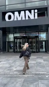 A vlog-style video featuring a creator visiting the newly refurbished Omni Centre in Edinburgh, showcasing the event atmosphere, the Vue cinema, and dining at Edinburgh Street Food.