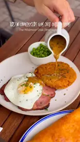 A short video showcasing a variety of classic pub dishes including eggs benedict, fish and chips, and sticky toffee pudding, alongside shots of the venue's outdoor seating area.