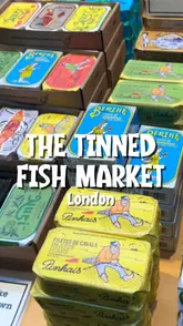 A short, energetic video showcasing a visit to The Tinned Fish Market in London, highlighting the extensive variety of tinned seafood products available for purchase.