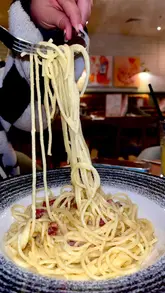 A promotional reel showcasing a bottomless pasta deal at Bella Italia. The video features the creator trying various pasta dishes including bolognese, lasagne, and carbonara, while highlighting the price and time limit of the offer.