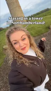 A vlog-style tour of a unique 18th-century tower accommodation in Northumberland, showcasing its five floors, including a bedroom, kitchen, living area, and an observatory with views of the countryside and coast.