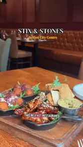 A video review of Stix & Stones in Belfast, featuring a tour of the restaurant, a look at their cocktail menu, and a detailed breakdown of their sharing boards, starters, and main courses, including the duck breast and chicken supreme.
