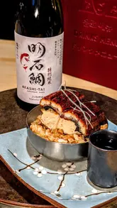 A montage video showcasing a curated sake pairing event at a Japanese restaurant, featuring various dishes and sake pairings.