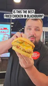 A review of a new fried chicken shop in Blackburn called Henny's, highlighting their variety of sauces, burger options (including potato buns), rice boxes, and desserts.
