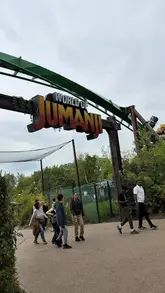 A short, energetic reel showcasing a family day out at Chessington World of Adventures, featuring POV footage from rollercoasters like Mandrill Mayhem and Dragon's Fury, alongside reactions from a child enjoying the rides.