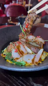 A review of The Ivy Asia's 'Dragon Lunch' menu in Liverpool, showcasing the interior, the set menu options, and various dishes including starters, mains, and desserts.