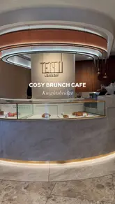 A short, aesthetic montage showcasing the interior, exterior, and food offerings of Ten 11 London, a cafe in Knightsbridge.