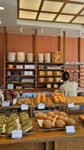 A short, visually appealing reel showcasing the new Arome bakery location in Chinatown, London. The video features a variety of pastries, tarts, and sandwiches, highlighting the specific menu items available at this new branch.