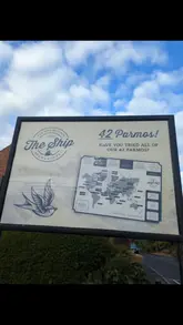 A short video showcasing 'The Ship at Redmarshall' pub, focusing on their extensive '42 Parmos' menu. The video features the exterior of the pub, a look at the menu, and close-ups of the parmo platters being enjoyed by a couple.