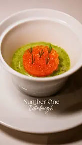 A montage video showcasing a high-end tasting menu experience at Number One, located within The Balmoral hotel in Edinburgh. The video highlights the intricate plating, wine service, and elegant atmosphere of the restaurant during a special guest chef event.