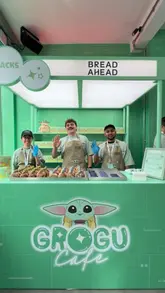A vibrant, fast-paced promotional reel for a Star Wars-themed Grogu pop-up café in Shoreditch, London. The video highlights the branded matcha bubble tea, themed donuts, merchandise, and interactive experiences like a claw machine and photo booth.
