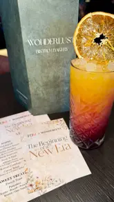 A promotional reel for Wonderlust Bistro & Bakery, showcasing the venue's interior, menu, and a variety of food and drink items including noodles, pancakes, and mocktails.