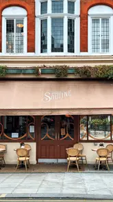 A short, polished montage showcasing the exterior, interior, and various dishes at Maison Soutine. The video focuses on the aesthetic appeal of the venue and the presentation of the food, using smooth, controlled camera work to create a sophisticated vibe.