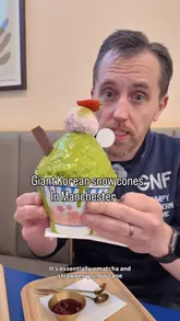 A review of Korean Bingsu (shaved ice dessert) at a venue in Manchester, showing the preparation process and the final product.