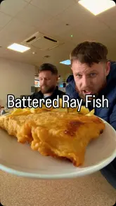 Two creators visit Carmine's Diner in Finglas Village to review the battered ray fish and chips, sharing personal memories associated with the dish.