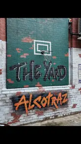 A promotional reel for Alcotraz Yard in Liverpool, showcasing the immersive prison-themed bar experience. The video features guests in orange jumpsuits engaging with various activities like board games, skittles, and basketball, while enjoying drinks in a themed outdoor setting.